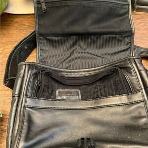 Tumi Black Laptop Bag with Structured Design and Quality Construction